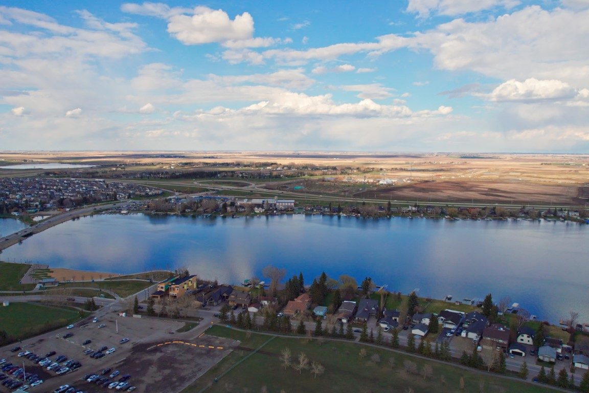 Aerial view of Chestermere Lake with surrounding residential neighbourhoods