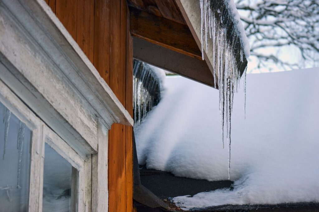 Ice dam buildup on roof edge