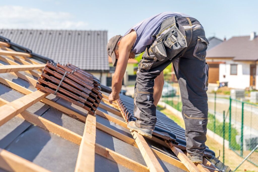 Calgary homeowner reviewing roofing contractor red flags checklist